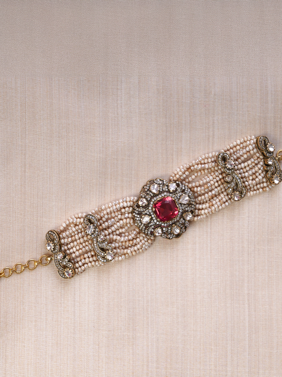 Sitaratna ruby pink pearl and moissanite statement bracelet styled on the wrist