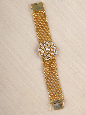 Sitaratna gold-plated floral moissanite mesh bracelet worn on wrist