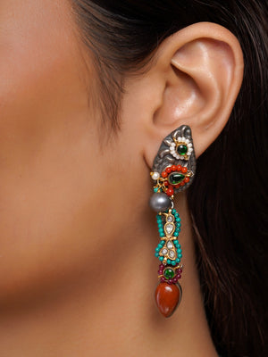 Sitamohur blue medallion charm fusion necklace set front view with matching long earrings styled on ivory gold saree