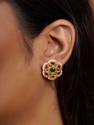 Samragni ruby pearl layered kundan choker close-up showing antique gold links, floral medallions and multiple pearl strands