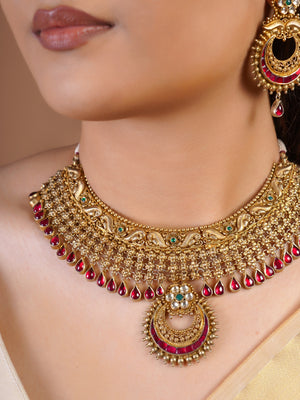 Samraagni ruby antique gold chain fringe choker necklace set with teardrop border, central crescent pendant and matching statement earrings