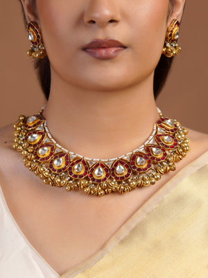 Samragni ruby kundan antique gold choker necklace set with teardrop motifs, white stones, pearl edging and matching earrings
