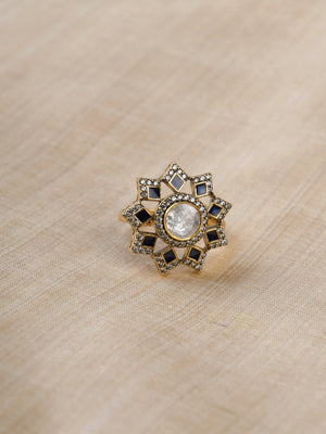 Sitaratna black and white starburst moissanite ring styled on hand