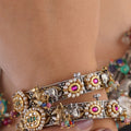 Samragni Gaja jadau pearl heritage bangle pair with elephant motifs, pink stones and multicolour bead accents by Sita Jewellery