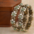 Sitaratna green bead and white moissanite leaf motif bangle pair in 925 sterling silver