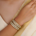 Sitaratna white moissanite floral cluster bangle pair handcrafted in 925 sterling silver