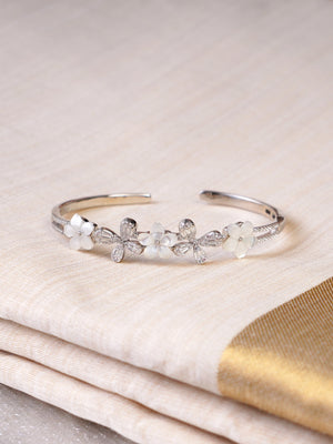 SITAMANI white floral butterfly AD/CZ cuff bracelet styled on wrist by SITA JEWELRY