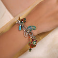 Sitamahor Navrangi heritage charm fusion bracelet shown flat with multicolour charms, pearls and mixed-metal details