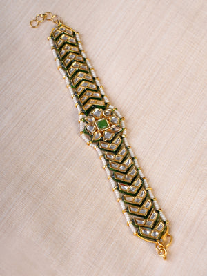 Samragni green meena kundan pearl bracelet styled on the wrist