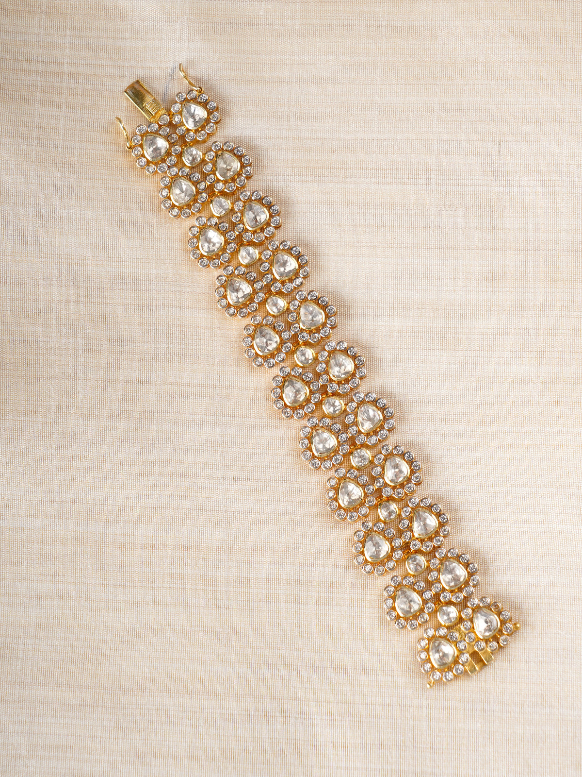 Sitaratna gold-plated teardrop moissanite bracelet styled on wrist