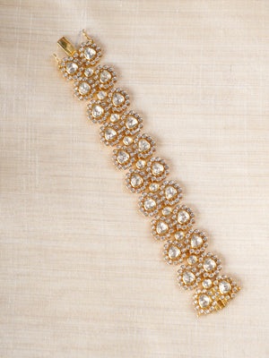 Sitaratna gold-plated teardrop moissanite bracelet styled on wrist