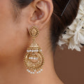 Sitamohur antique gold pearl chandbali jhumka fusion earring styled on the ear