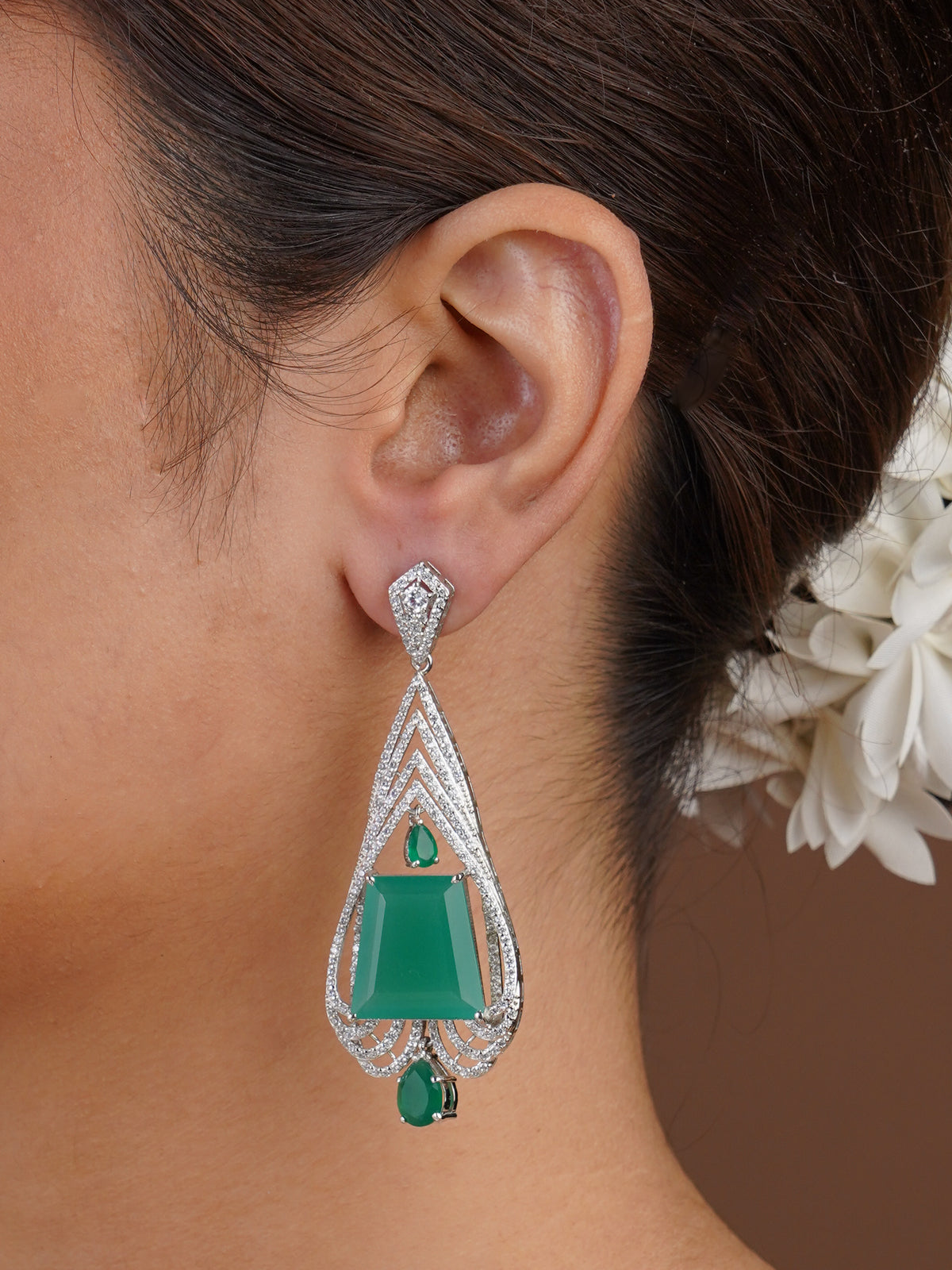 Sitamani emerald green geometric CZ statement earring styled on the ear