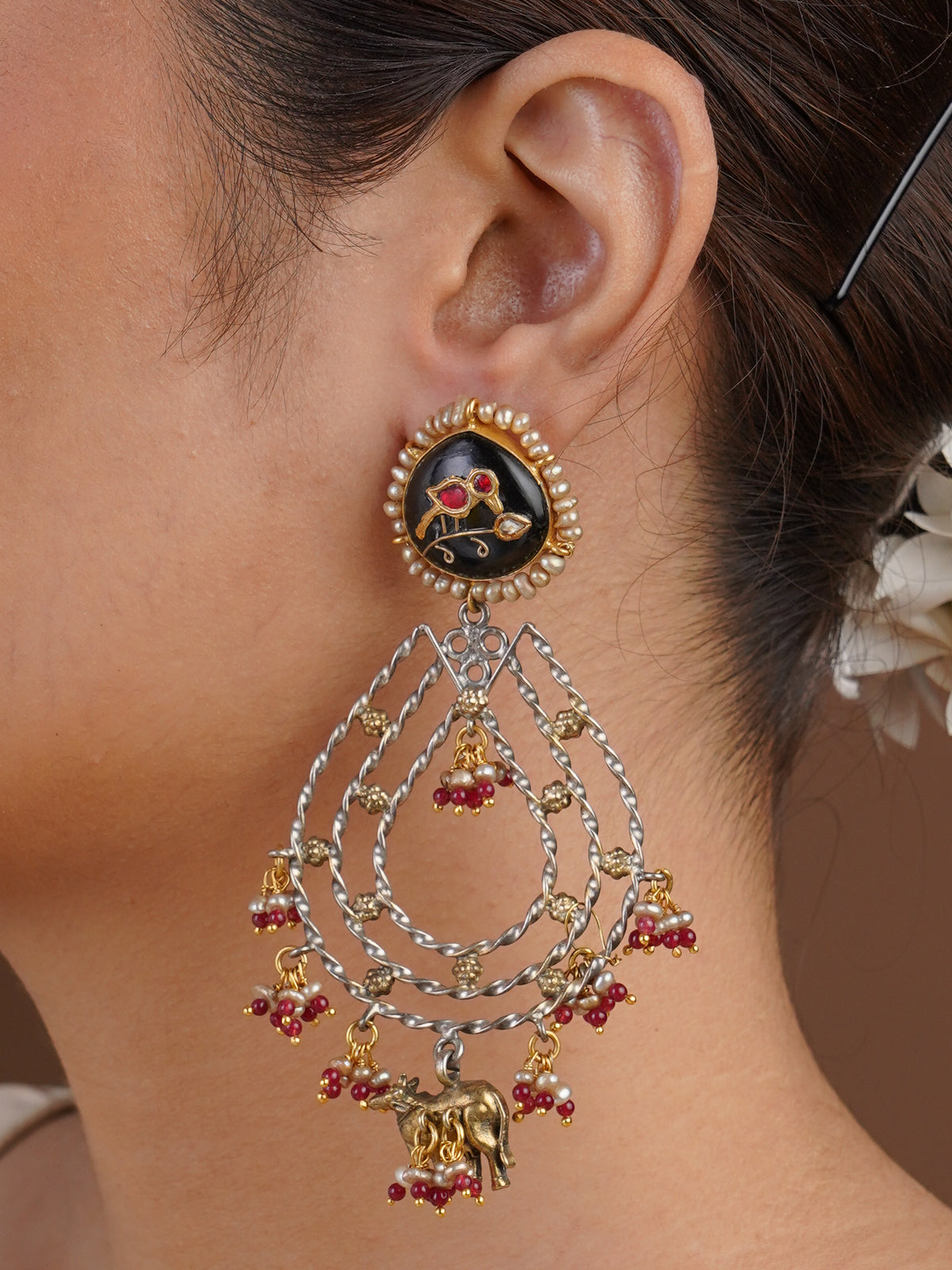 Sitamohur black stone animal charm fusion chandelier earring styled on the ear