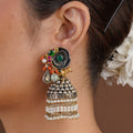 Sitamahor green stone pearl jhumka fusion statement earring styled on the ear