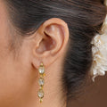 SITA RATNA three-stone linear moissanite earrings handcrafted in 925 sterling silver with antique gold polish