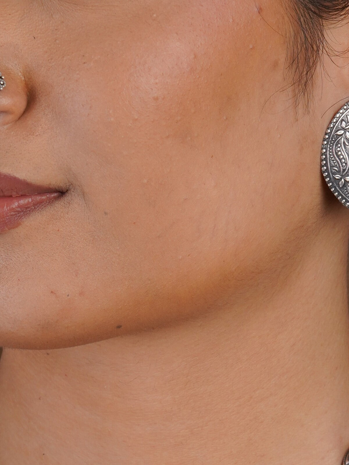 Sitavan floral mandala oxidized statement stud earring with engraved circular silver-tone design