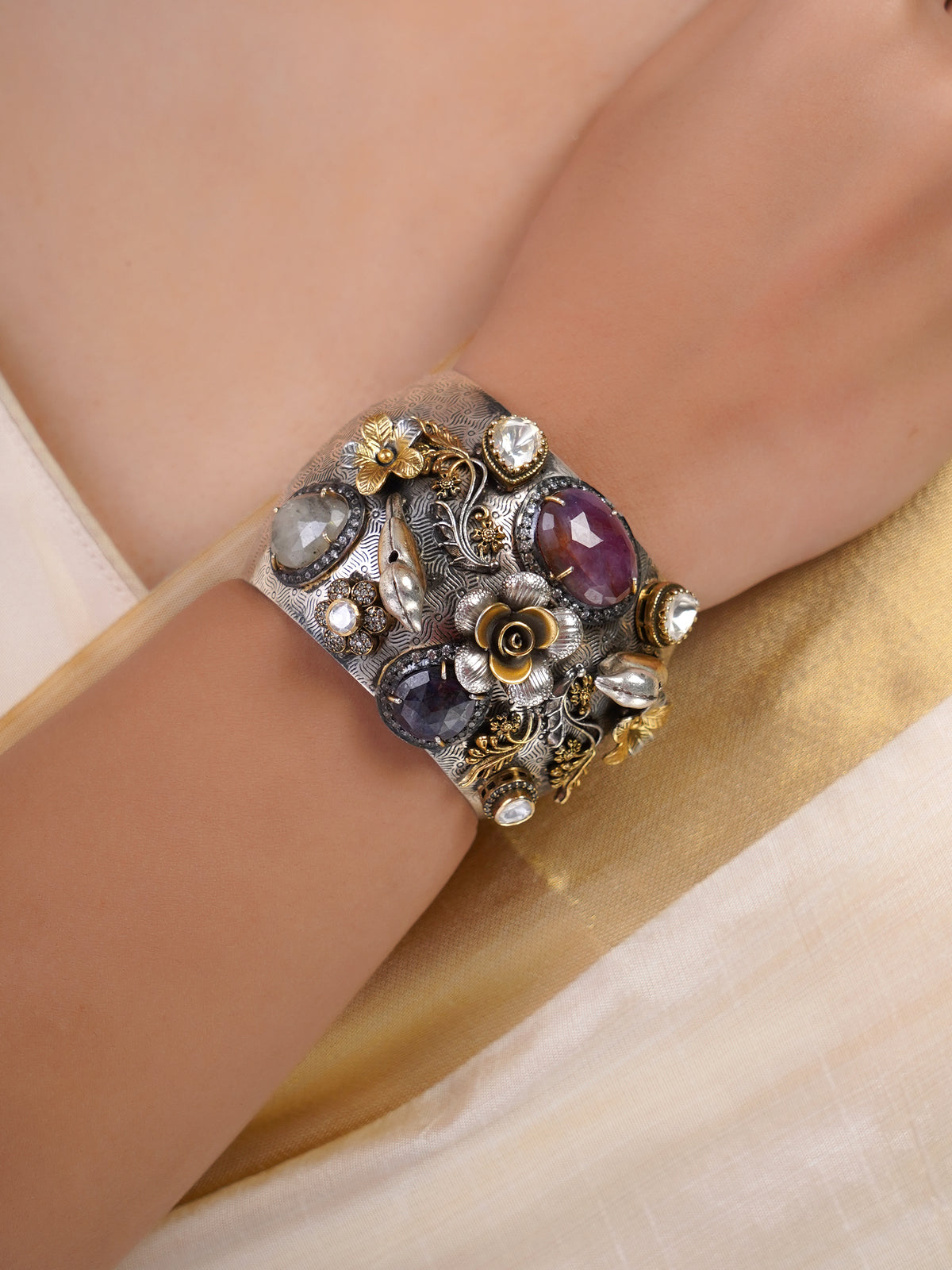 Sitamahor sculpted floral gemstone fusion cuff with wide silver tone base gold flowers and purple faceted stones