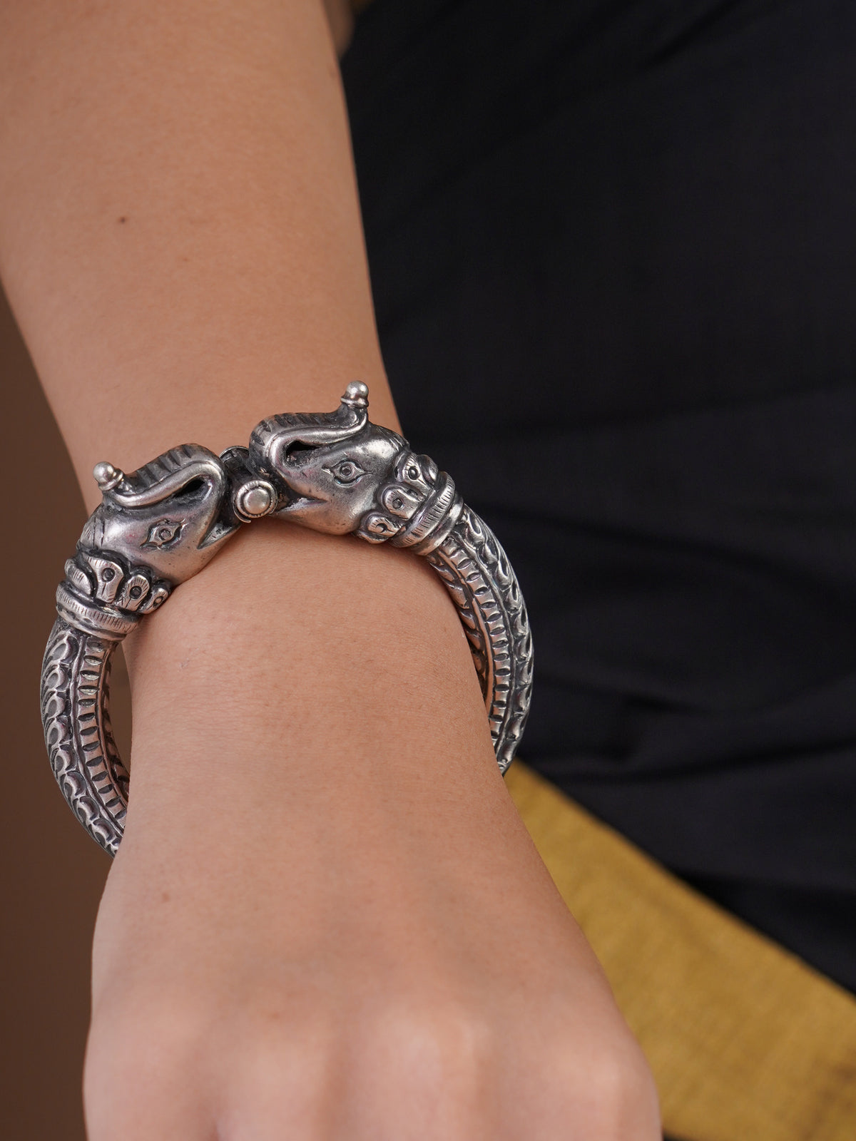 Sitavan twin elephant oxidized silver Kada with sculpted facing elephant heads and carved heritage band