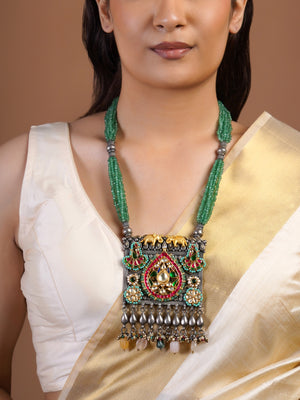 Close view of Sitamohur emerald elephant fusion necklace with peacock motifs ruby turquoise kundan details and silver drops