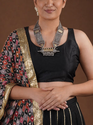 Sitavan chain panel ghungroo oxidized tribal necklace styled with black blouse and geometric silver-tone panels
