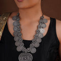 Sitavan floral coin oxidized silver long necklace with engraved medallions and large teardrop statement pendant