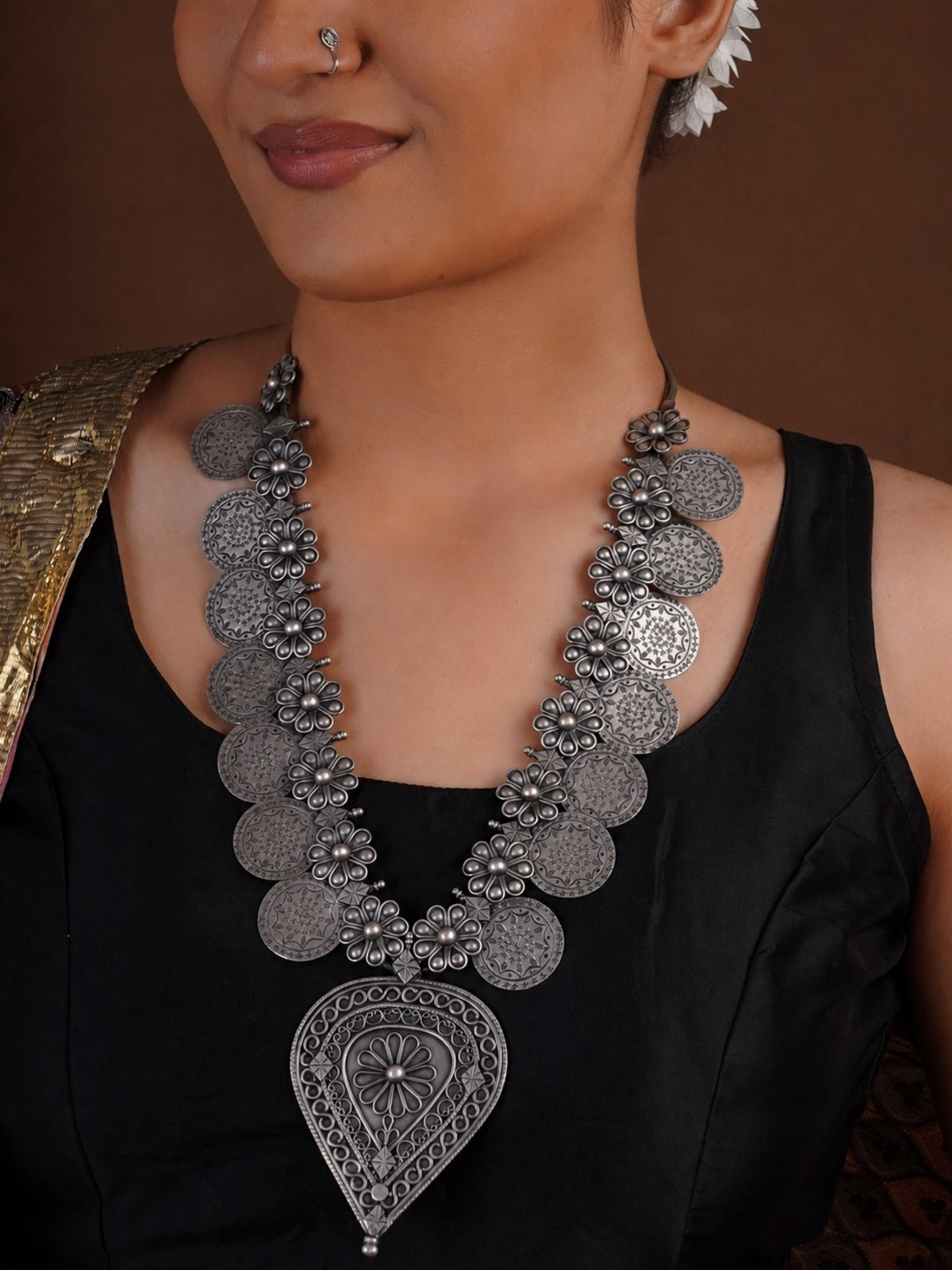 Sitavan floral coin oxidized silver long necklace with engraved medallions and large teardrop statement pendant