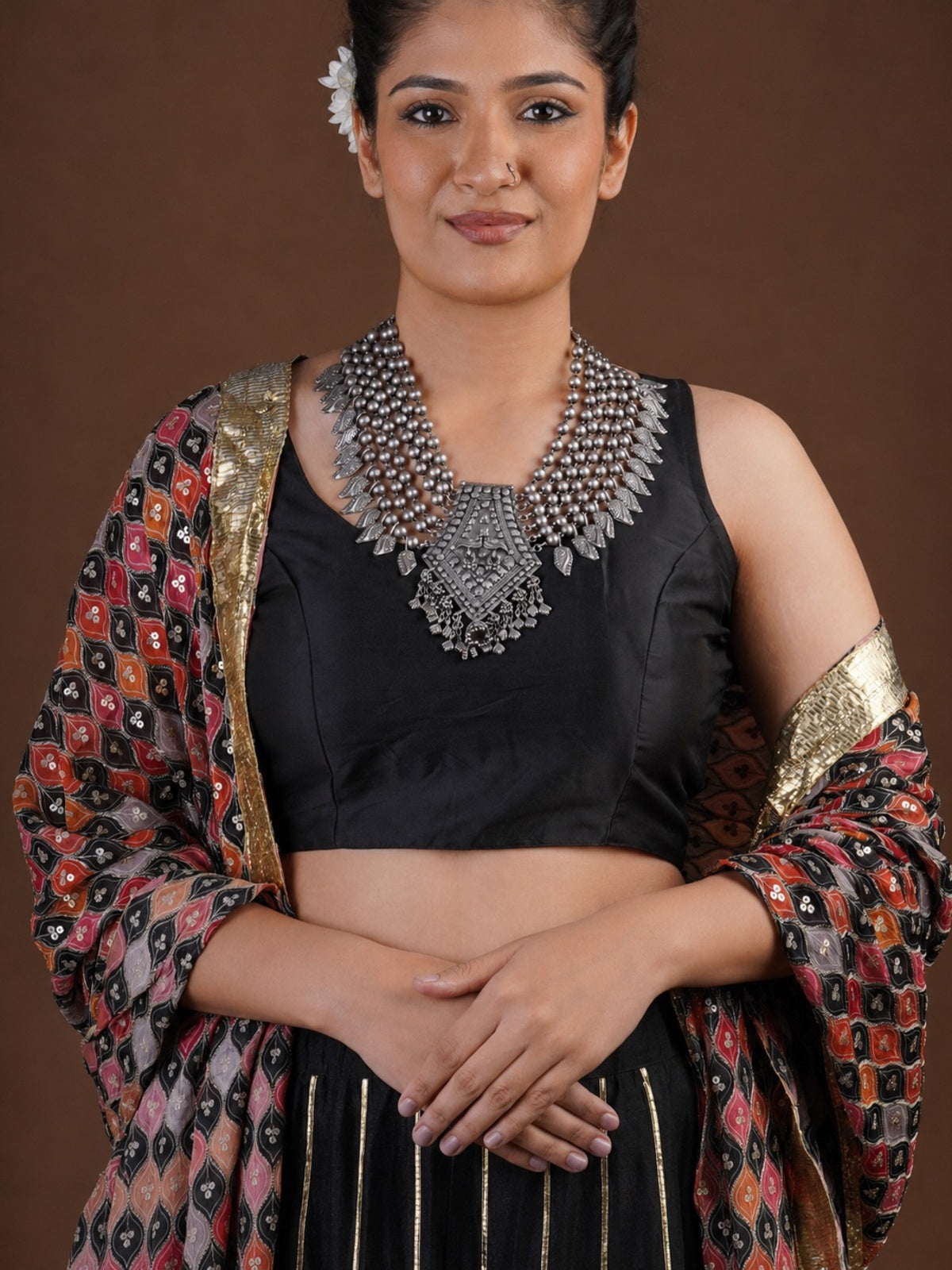 Sitavan layered oxidized silver statement necklace with multiple bead strands, engraved leaf fringe and geometric centre pendant