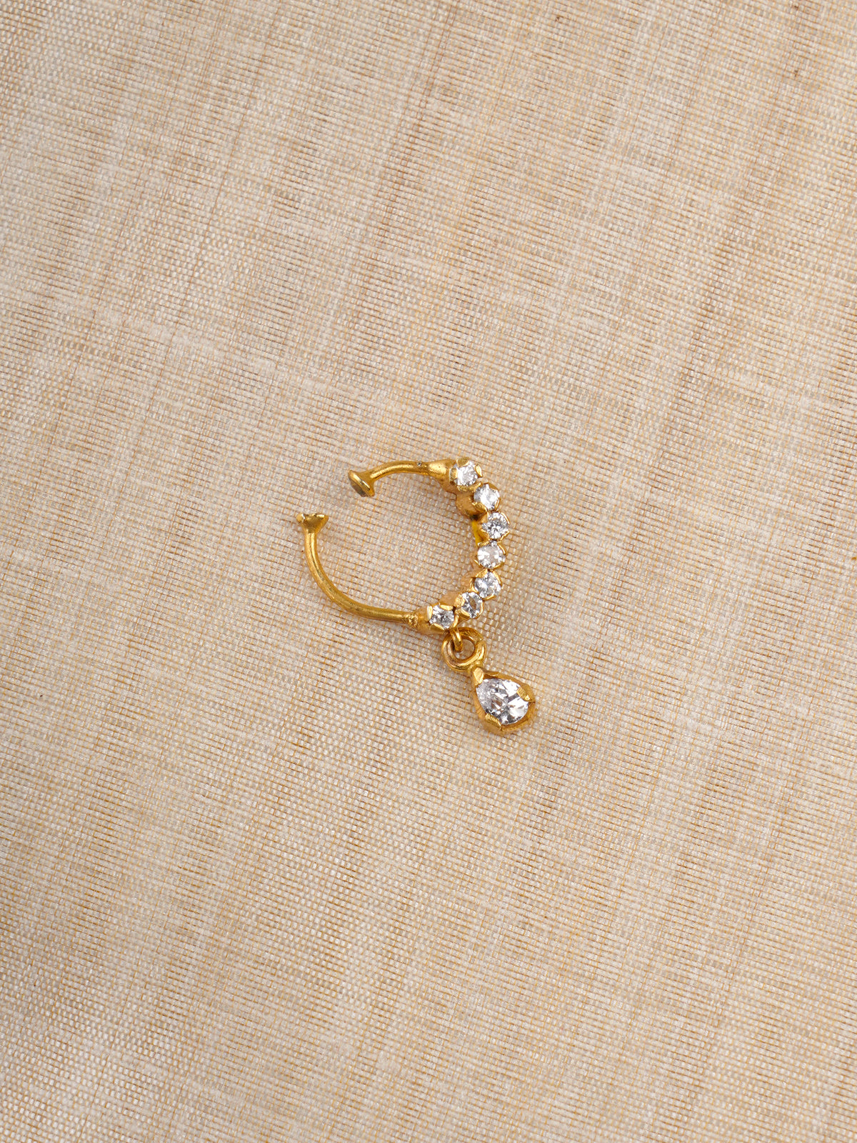 Sitaratna gold-plated delicate moissanite drop nath worn on model