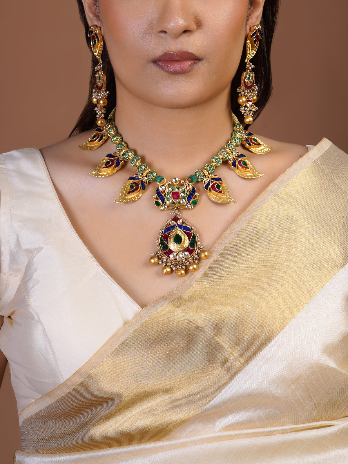 Samragni meenakari peacock leaf kundan necklace close-up with multicolour enamel, green beads and statement teardrop pendant
