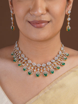 Sitamani emerald green AD necklace matching earring close-up with floral white stones and green oval drop