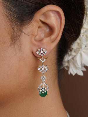 Sitamani emerald green floral AD CZ necklace set front view styled with ivory and gold saree