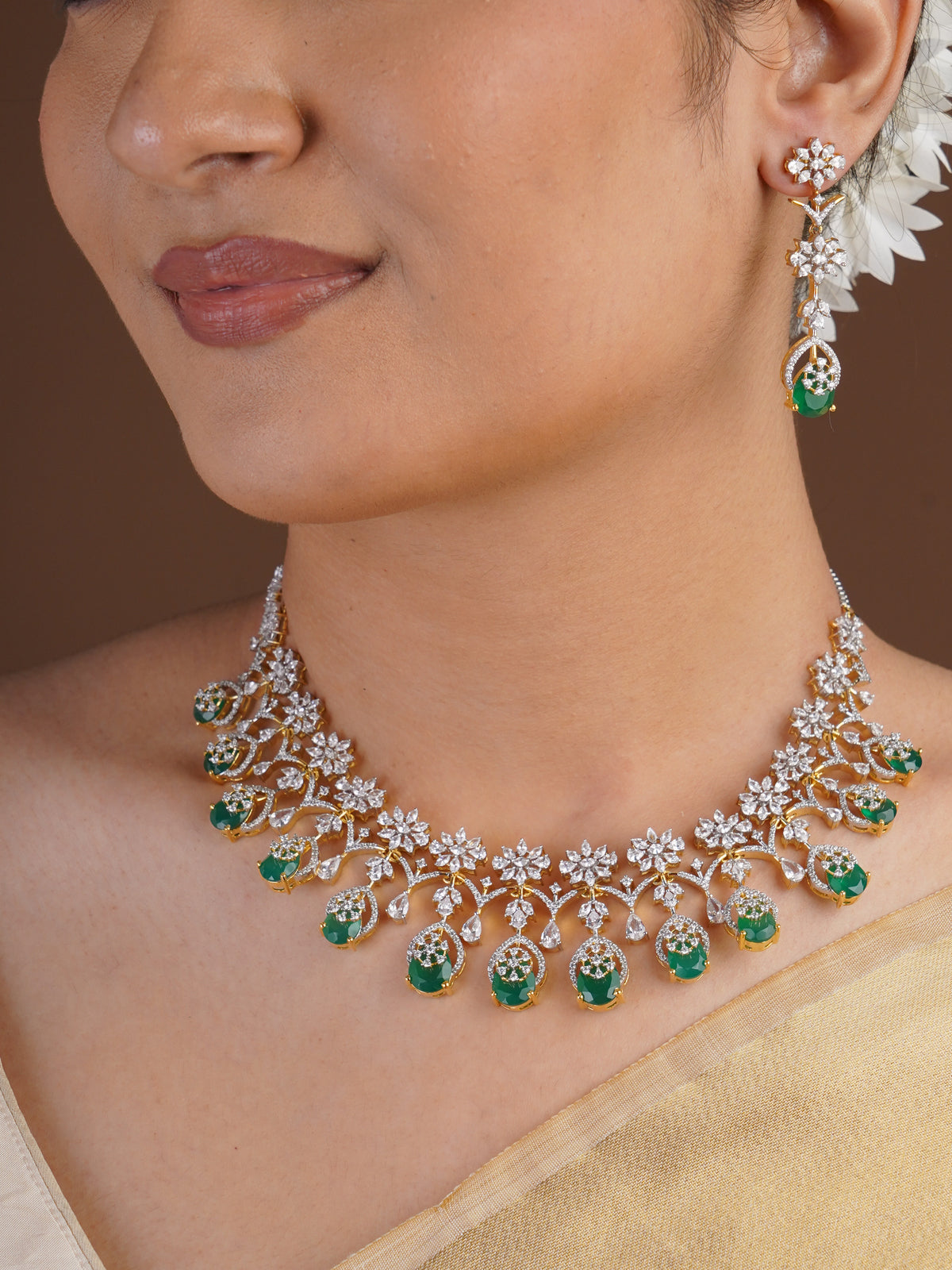 Sitamani emerald green floral AD CZ necklace set with sparkling white stone vines and matching drop earrings