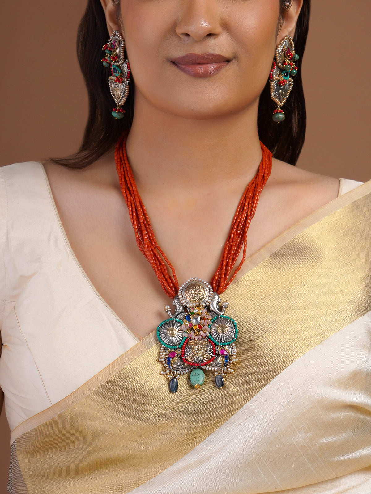 Sitamahor coral-orange multi-strand bead fusion necklace with mixed-metal heritage pendant and matching statement earrings