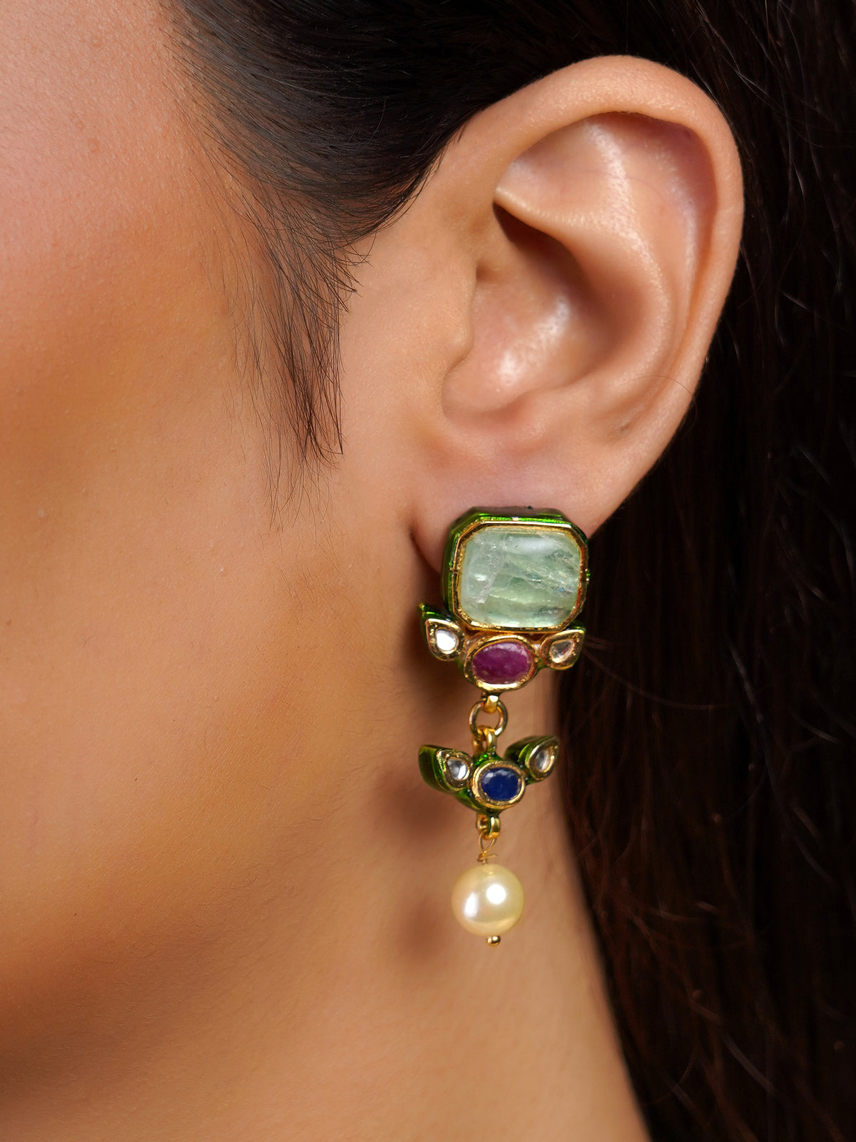 Samragni matching aqua multicolour kundan earring close-up with pale green stone, ruby blue accents and pearl drop
