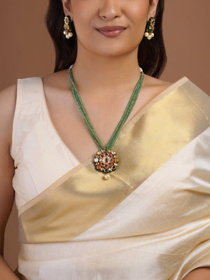 Samragni green bead navratna floral kundan pendant necklace with ruby centre, multicolour stones and single pearl drop
