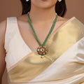 Samraagni green bead navratna floral kundan pendant necklace with ruby centre, multicolour stones and single pearl drop