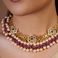 Samragni layered pearl and ruby bead kundan choker necklace set with green floral medallions and matching round stud earrings