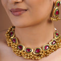 Samraagni ruby green antique gold guttapusalu style collar necklace with clustered gold bead fringe and matching statement earrings