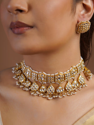 Samragni white kundan rectangular stud earring close-up with grid-set stones and pearl border