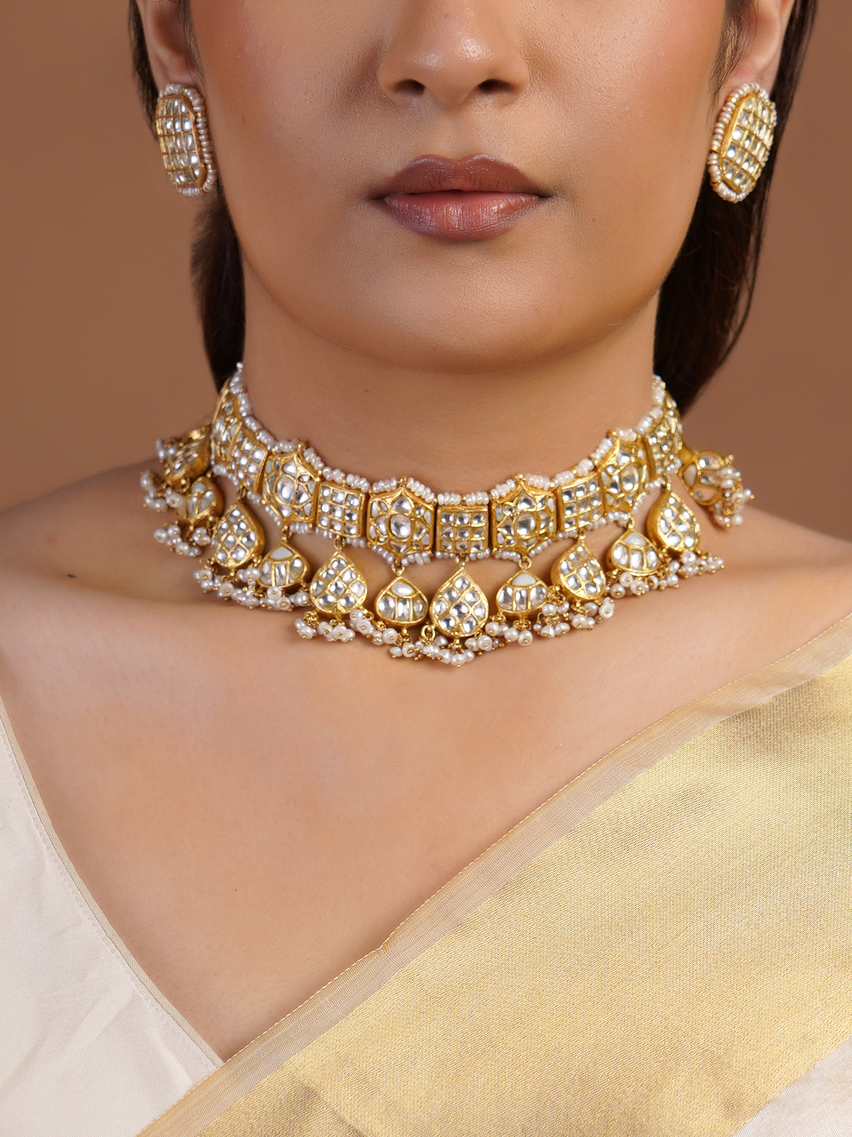 Samragni white kundan pearl drop bridal choker necklace set with geometric stones, teardrop hangings and matching statement studs