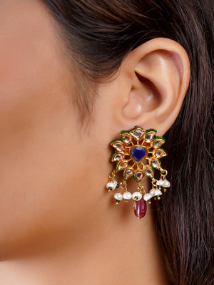 Samragni ruby bead necklace pendant close-up with deep blue centre, kundan-style white stone halo and gemstone drops