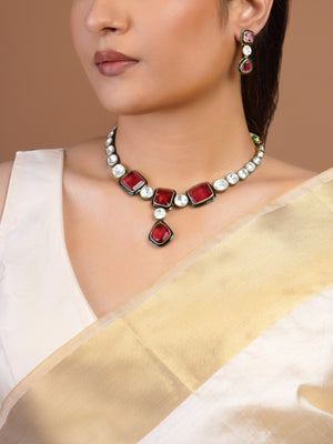 Samragni ruby red and white kundan necklace set with green enamel-style borders, central drop and matching earrings