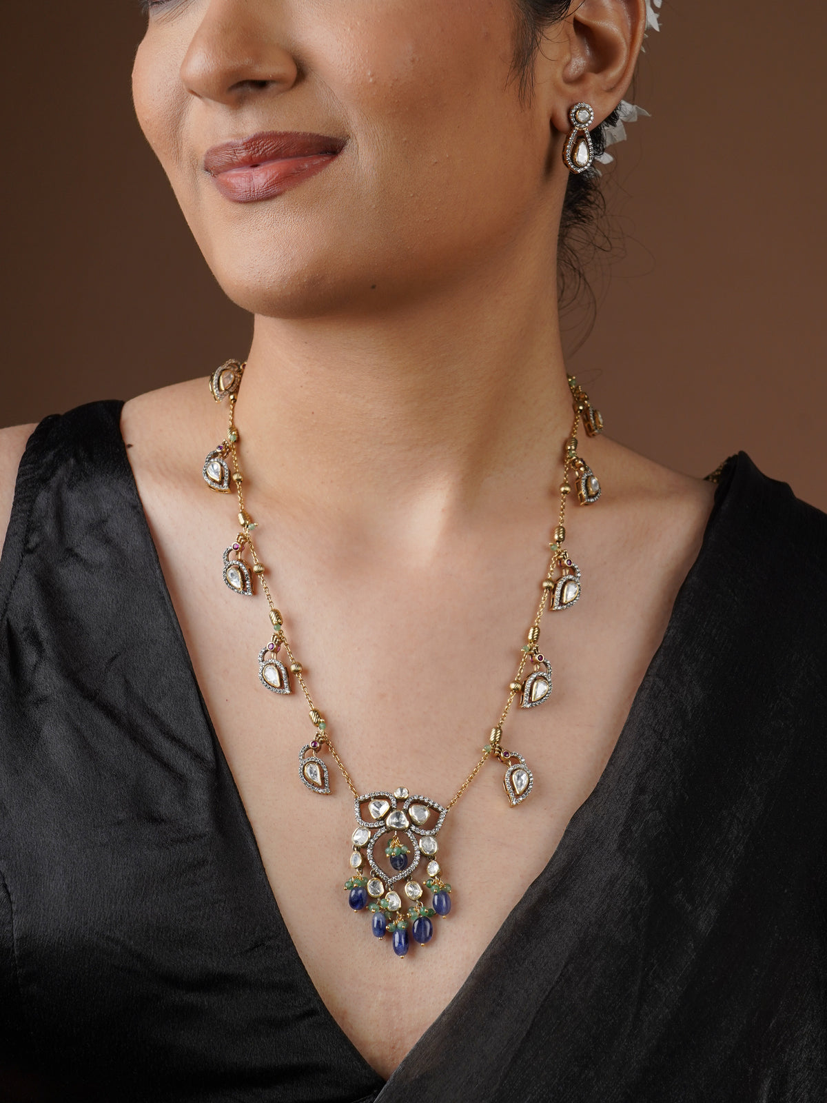 SITA RATNA blue drop moissanite necklace pendant close-up