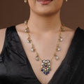 SITA RATNA blue drop teardrop moissanite necklace set styled on model in black saree