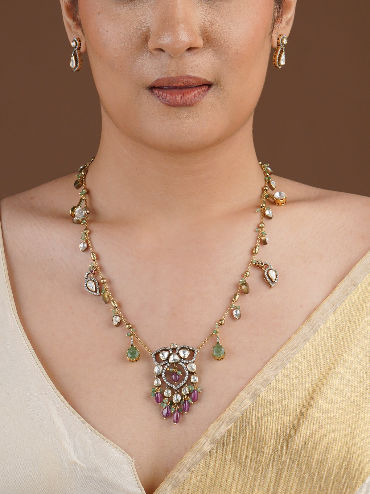SITA RATNA pink drop teardrop charm moissanite necklace set styled on model