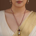 SITA RATNA ruby carved drop moissanite necklace set styled on model