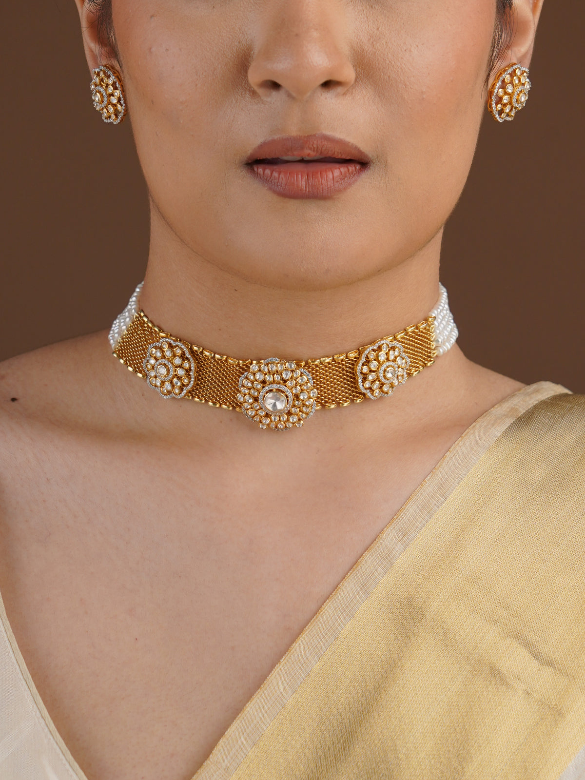 SITA RATNA floral mesh moissanite choker set with matching stud earrings styled on model