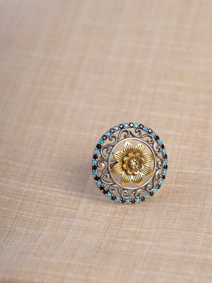 Sitamahor turquoise floral dual-tone fusion statement ring shown on hand with round oxidized silver and gold design