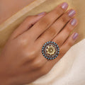 Sitamahor round dual-tone fusion statement ring with antique gold floral centre, oxidized silver scrollwork and turquoise-blue border accents